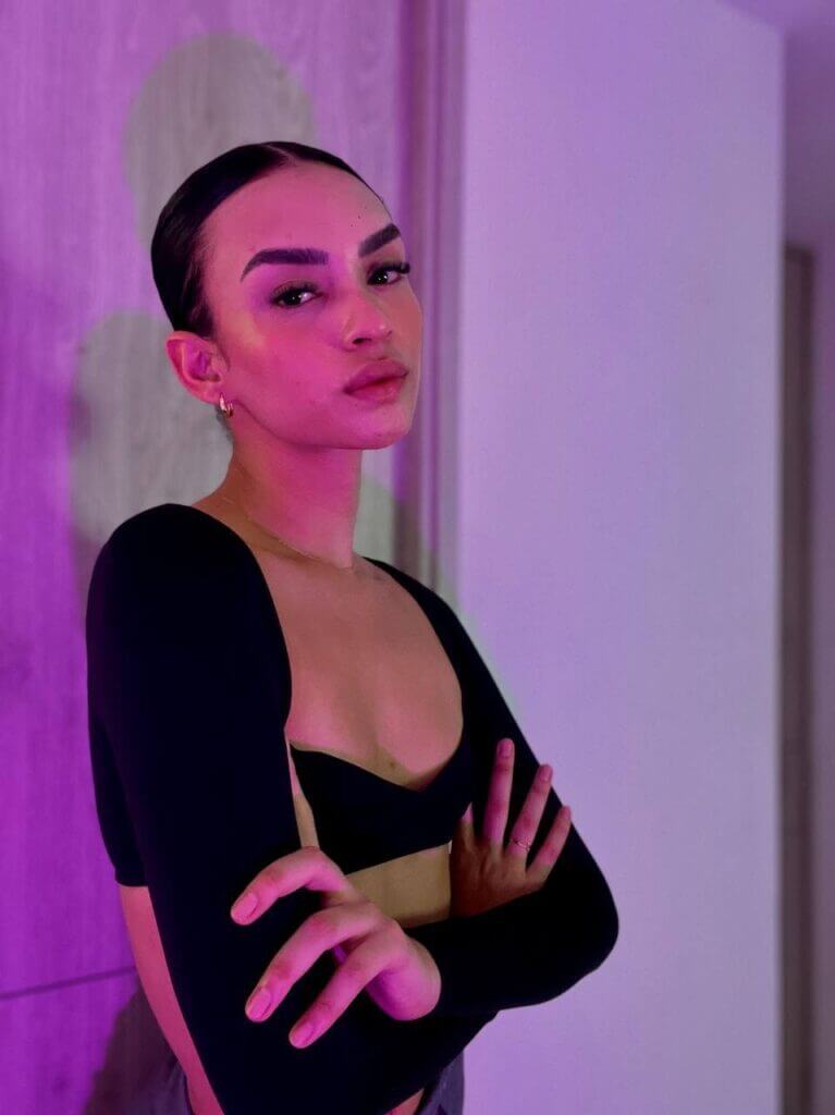 Roxy Baby – Trans OnlyFans star serving fierce looks in moody lighting